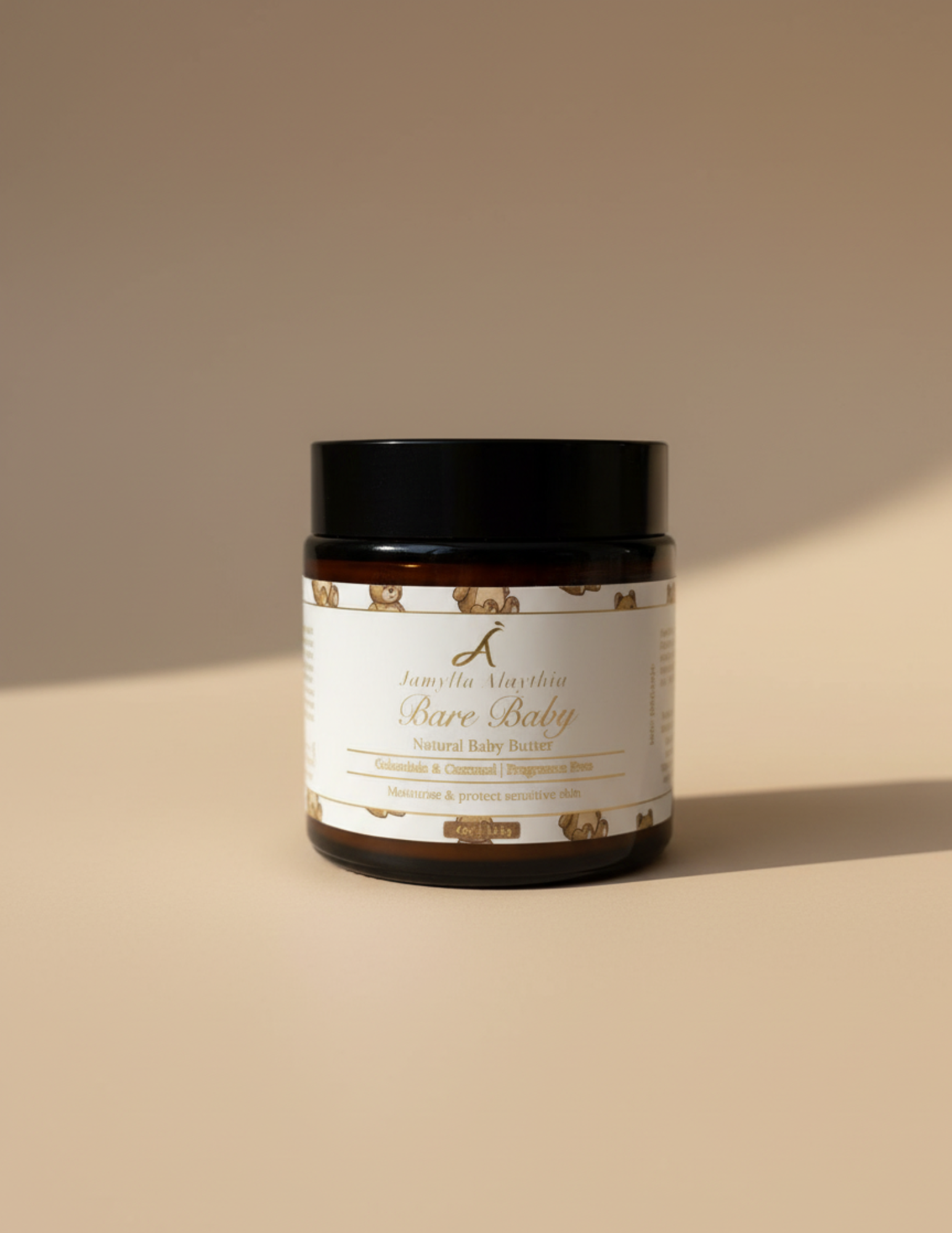 Jar of 'Baby Bare' whipped baby butter  on a beige background
